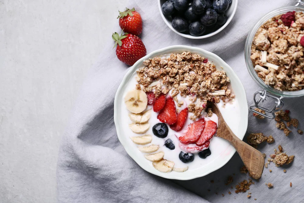 Healthy breakfast with granola fruits